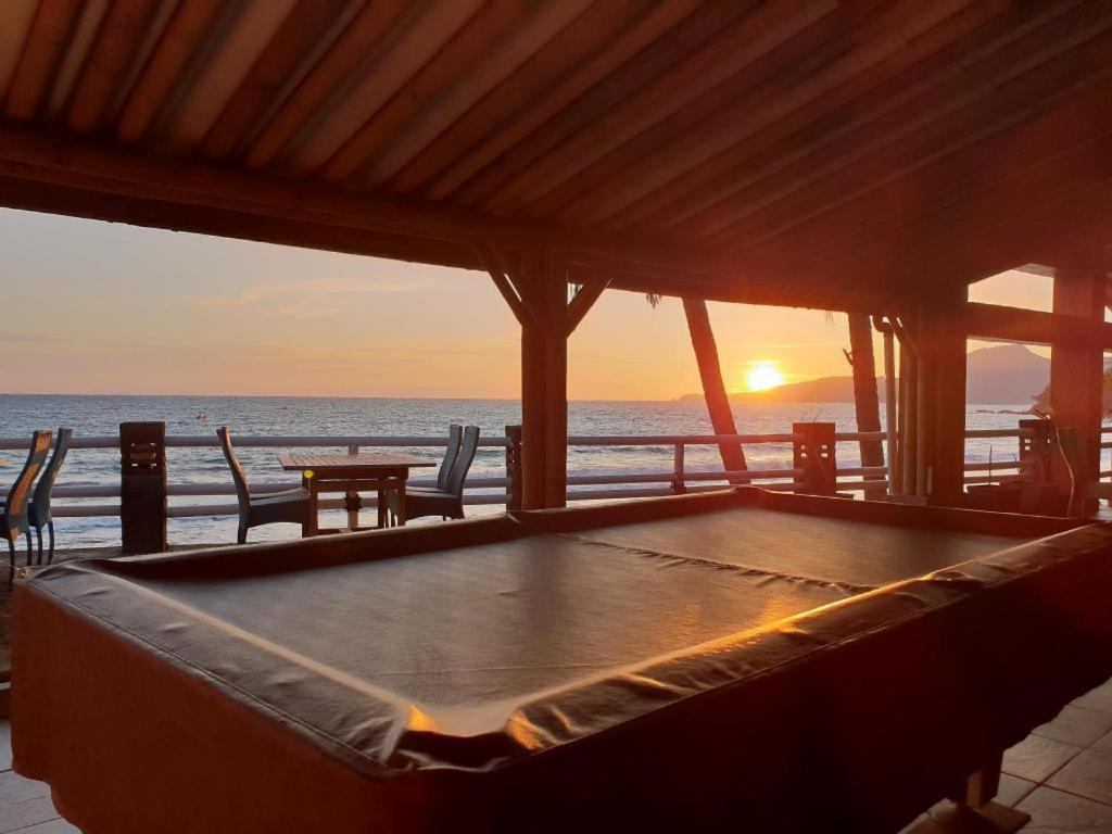 Отель 77 Sunset Plaza Cisolok Экстерьер фото